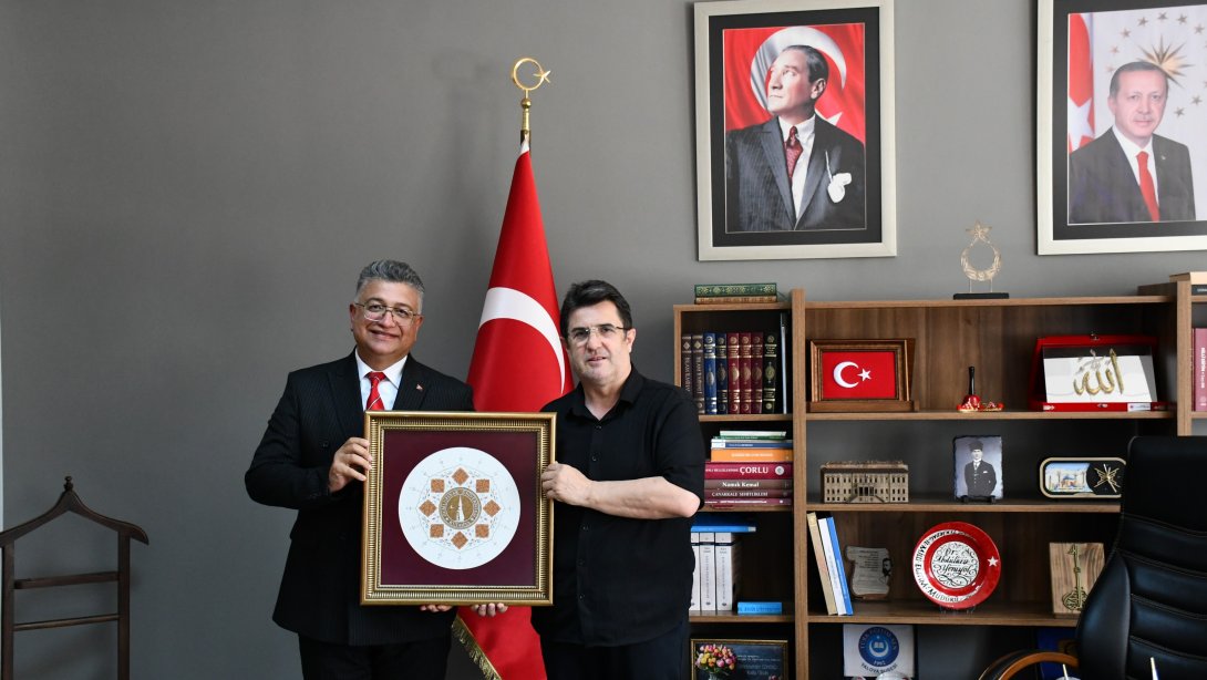 Kütahya Dumlupınar Üniversitesi Rektörü Prof. Dr. Süleyman Kızıltoprak’tan İl Millî Eğitim Müdürü Dr. Aziz Yeniyol’a Ziyaret